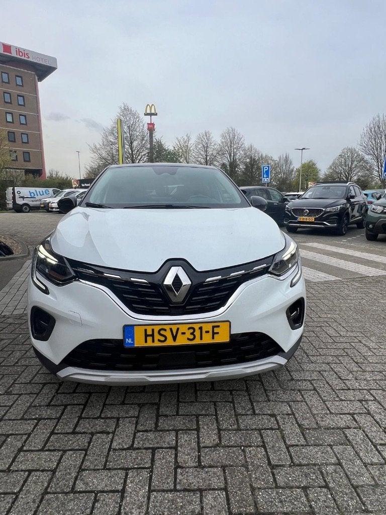 Renault Captur E-tech Plug-in Hybrid 160pk Aut 2020 Wit, Auto's, Lichtsensor, 4 cilinders, Leder en Stof, Wit