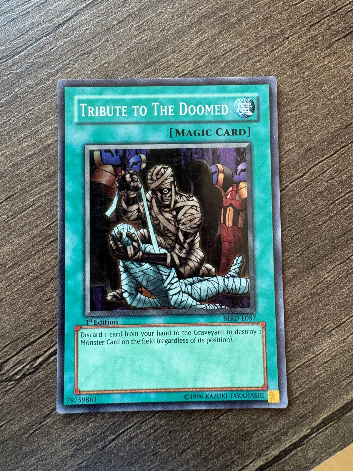 Tribute to the Doomed Holo (MRD-E057) 1st Edition GD/EX, Ophalen, Gebruikt, Losse kaart