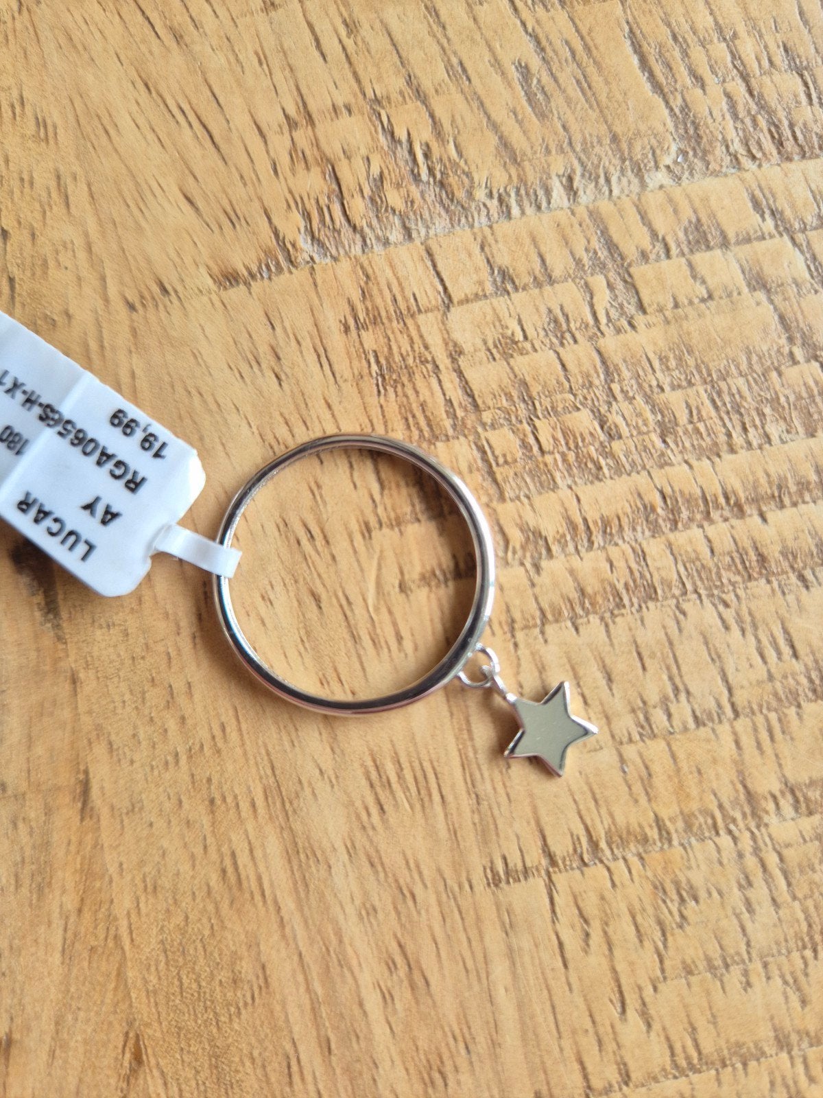 RVS ring met sterretje, 20 of groter, IJzer of Staal, Ophalen of Verzenden, Zo goed als nieuw