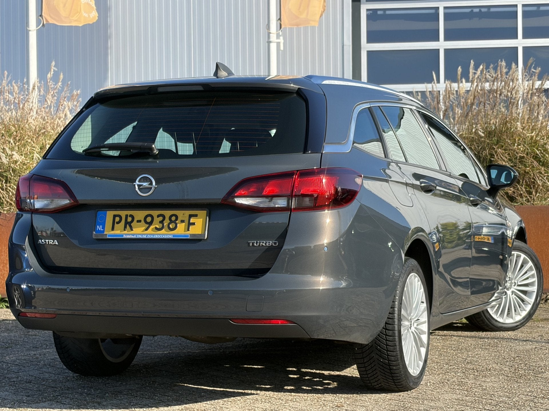 Opel Astra Sports Tourer 1.4 Turbo S/S 125pk | Apple Carplay, Auto's, Voorwielaandrijving, Gebruikt, 4 cilinders, Leder en Stof