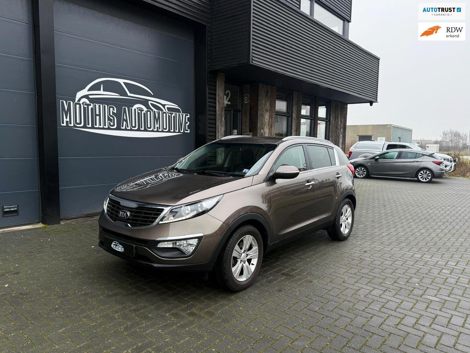 Kia Sportage 1.6 GDI 20th Anniversary 1e eigenaar, Auto's, Kia, Euro 5, 135 pk, 4 cilinders, Bruin