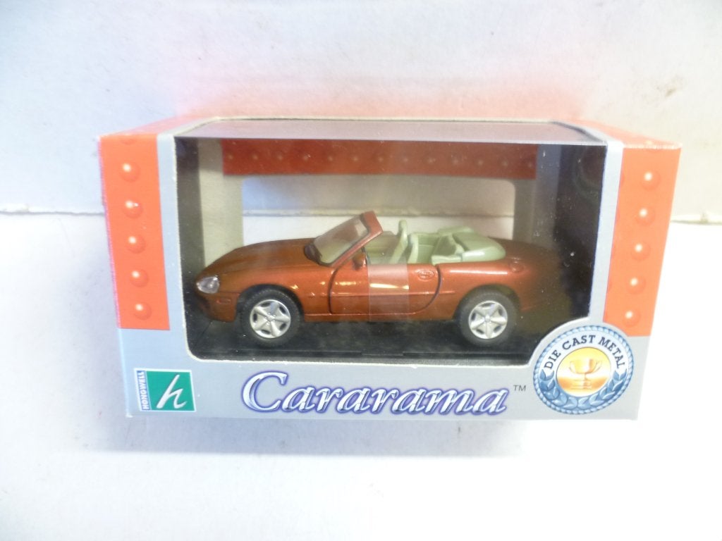 Cararama Jaguar XK8 donkerrood 1:43 modelauto., Ophalen of Verzenden, Nieuw, Auto, Overige merken