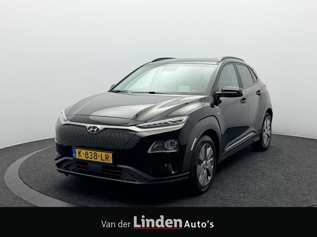 Hyundai KONA EV Limited 64 kWh 3- Fase SOH 95,1% | Warmtepom, Auto's, Hyundai, Gebruikt, Zwart, Zwart, 39 min