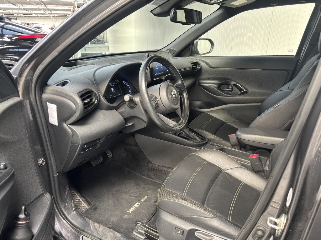 Toyota Yaris Cross 1.5 Hybrid Launch Edition Stuur/Stoel en, Auto's, Toyota, Gebruikt, 116 pk, Bedrijf, Automatische klimaatregeling