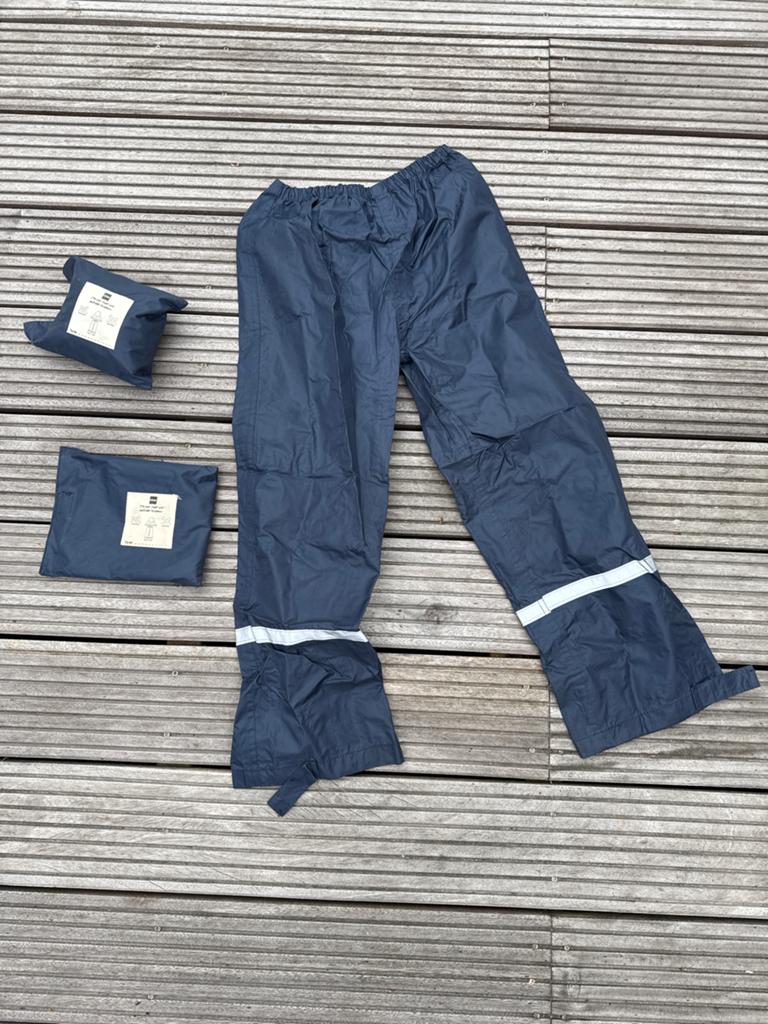 2x HEMA regenbroek met zakje - waterdicht en ademend, Ophalen of Verzenden, Zo goed als nieuw