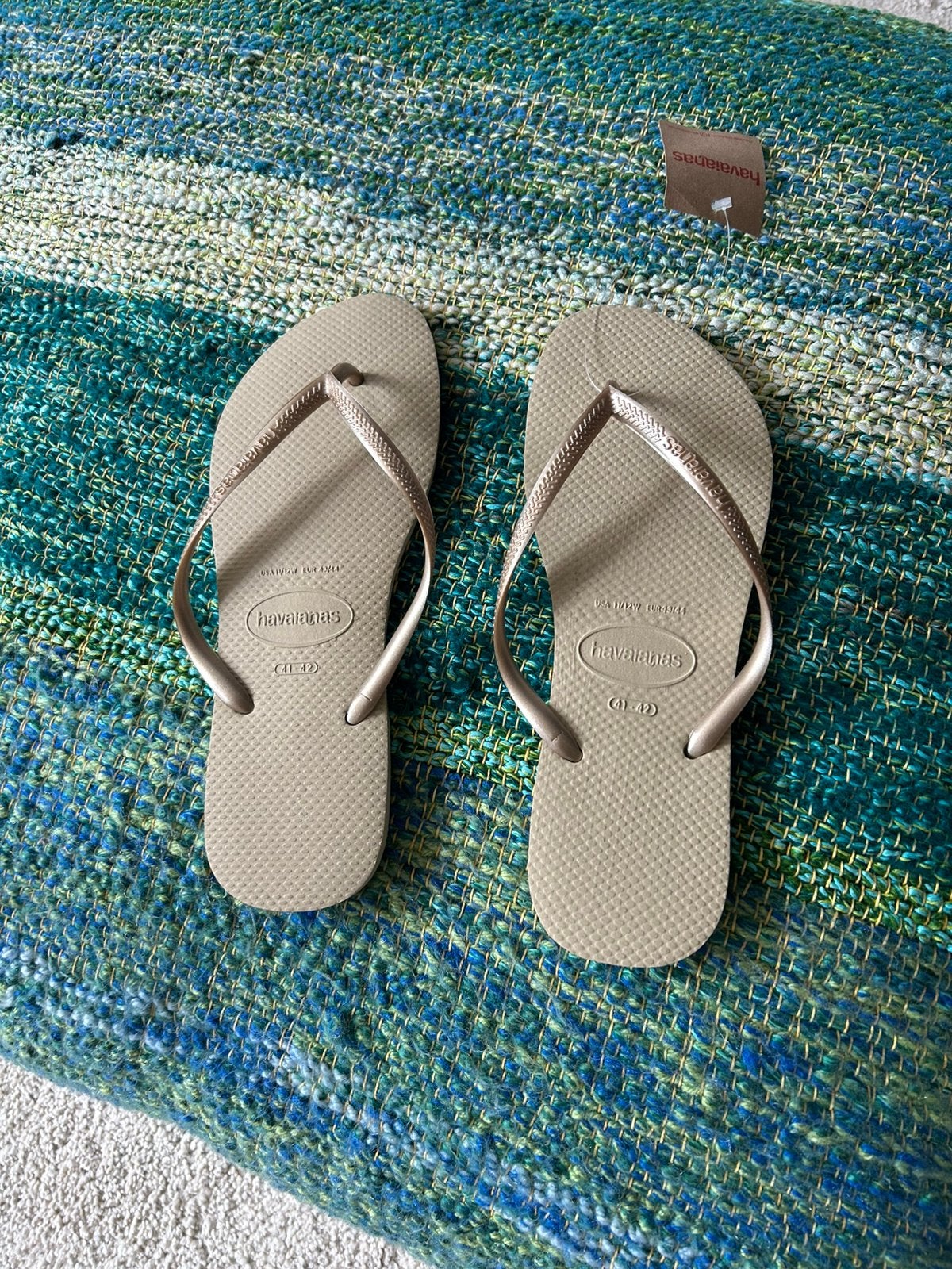 Slippers maat 41 - 42 nieuw Havaianas goud / beige, Ophalen of Verzenden, Zo goed als nieuw, Beige, Sneakers of Gympen