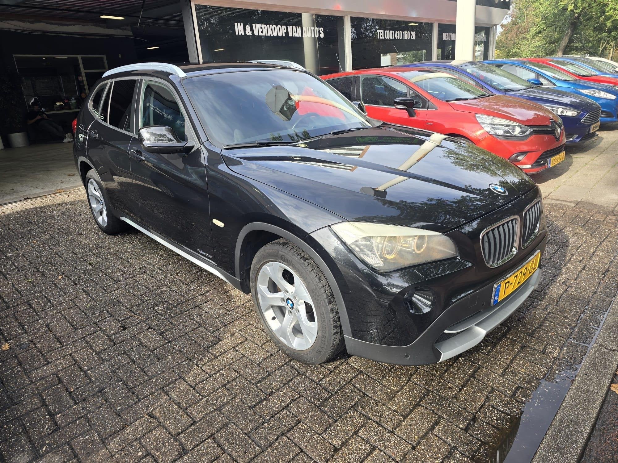 BMW X1 xDrive20i Business, Auto's, Stof, Gebruikt, 4 cilinders, 2000 kg
