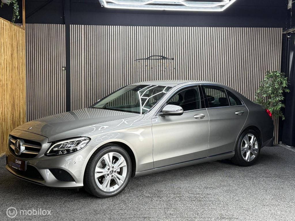 Mercedes C-klasse 180 Advantage Pack|Navi|Pdc|Led|Sfeer|Leer, Auto's, Achterwielaandrijving, Gebruikt, Zwart, Leder en Stof