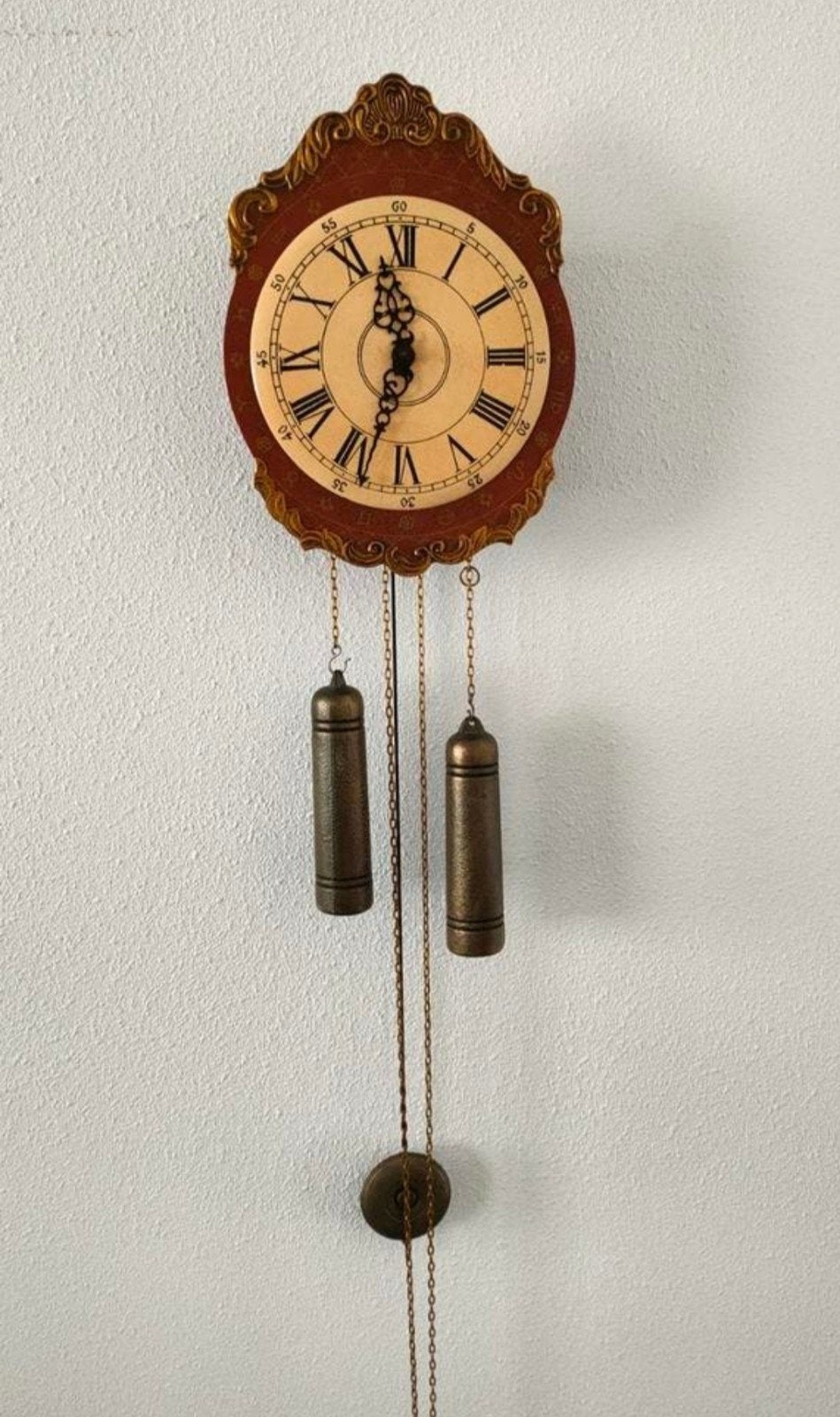 Antieke hangklok, Ophalen