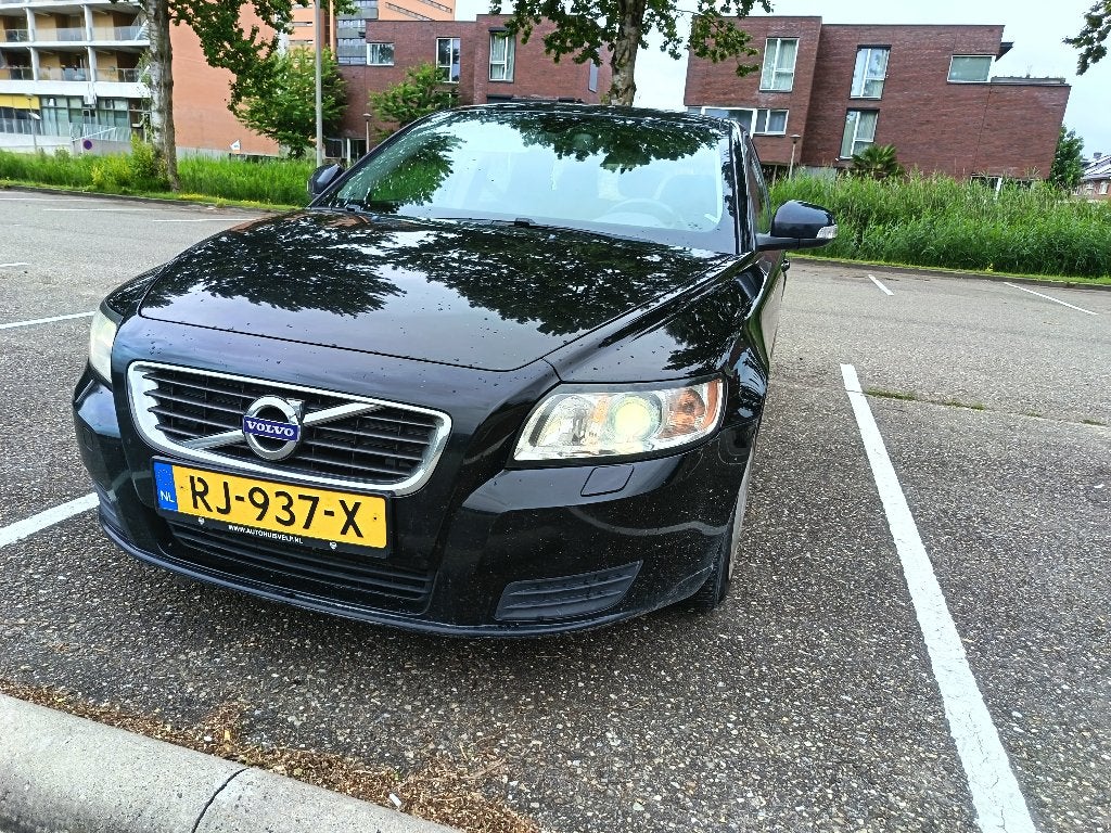 Volvo V50 1.6 D 2010 Zwart, Auto's, Volvo, Voorwielaandrijving, Stof, Zwart, 4 cilinders