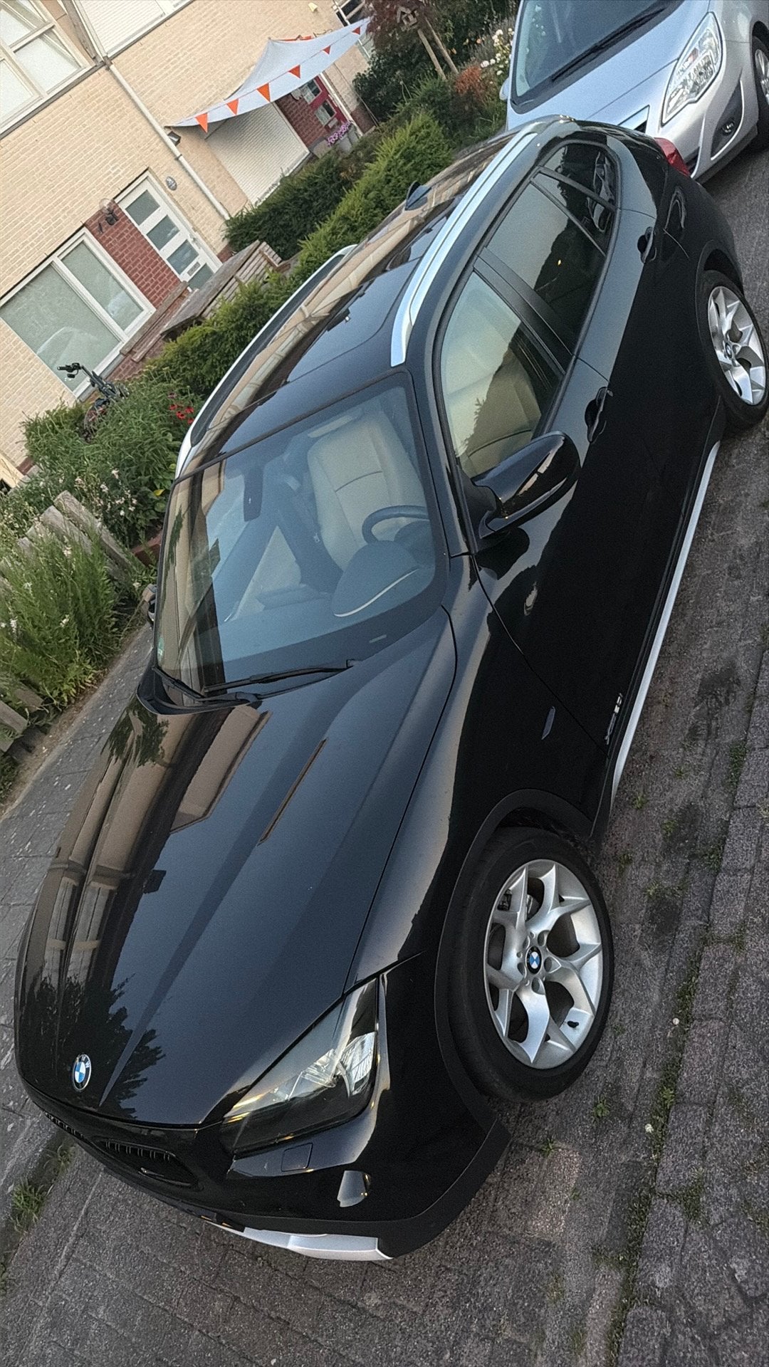 BMW X1 2.0 Xdrive 20I AUT 2012 Zwart, Auto's, BMW, Beige, 4 cilinders, 2000 kg, Zwart