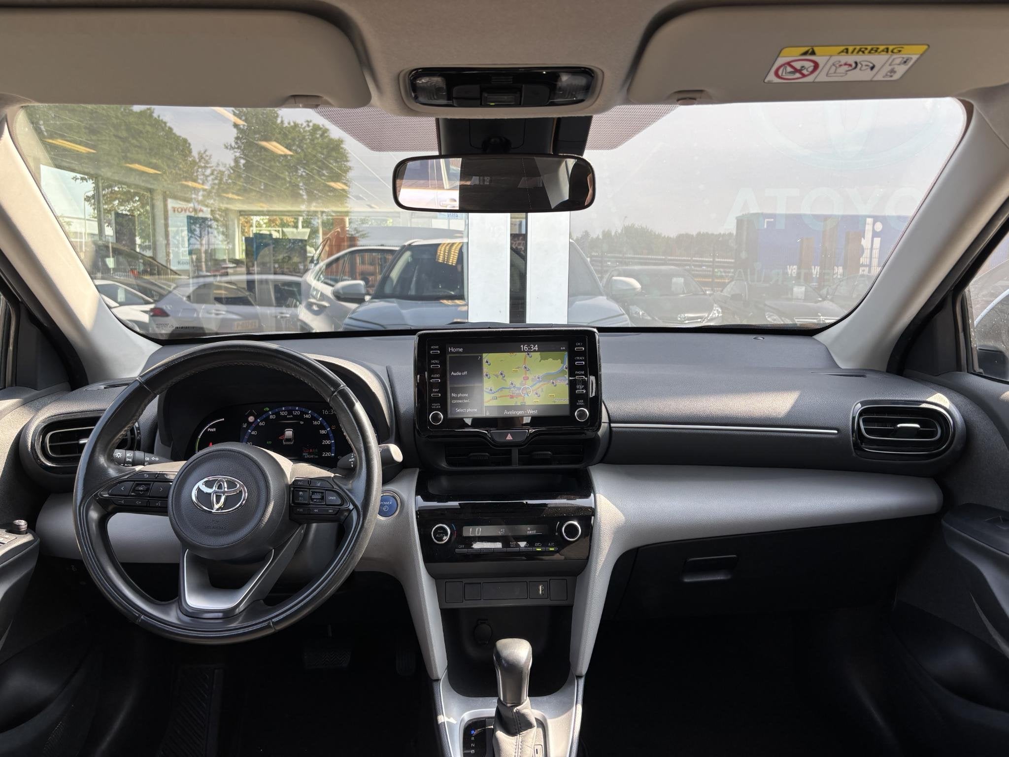 Toyota Yaris Cross 1.5 Hybrid 115 Dynamic | Parkeersensoren, Auto's, Stof, Gebruikt, 116 pk, Wit