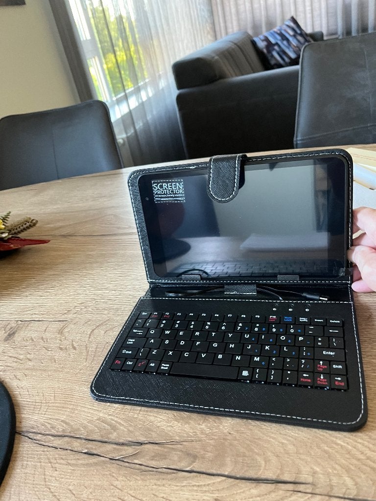 Nieuwe Ipad met qwerty toetsenbord,oplader case  en oortjes., Computers en Software, Apple iPads, Overige modellen, 32 GB, Zwart
