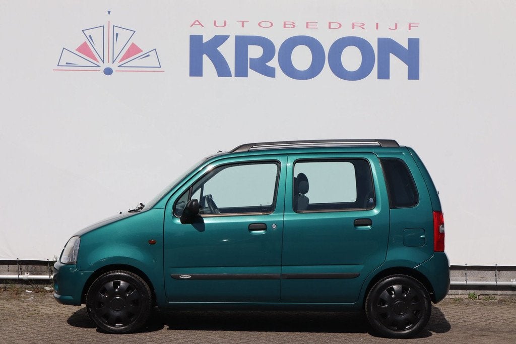 Suzuki Wagon R+ 1.0 GLX i apk T/M 18-05-2027, Voorwielaandrijving, Zwart, Metallic lak, Wagon R+