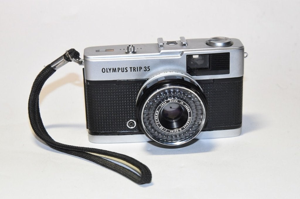 Olympus Trip 35 Zuiko 2,8/40mm rode vlag zie foto., Ophalen of Verzenden, Gebruikt, Compact, Olympus