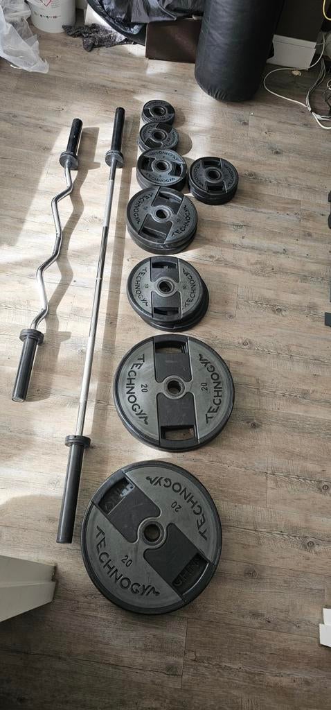 Technogym Olympische Barbell Set met 147,5 KG gewichten, Ophalen, Gebruikt, Benen, Overige typen