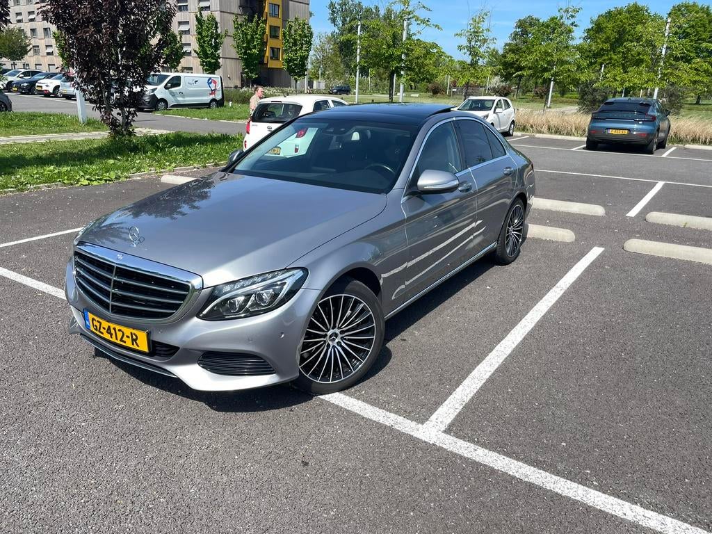 Mercedes-Benz C180 Automaat | Pano | Iridium Silver Metallic, Automaat, 1800 kg, Leder en Stof, Particulier
