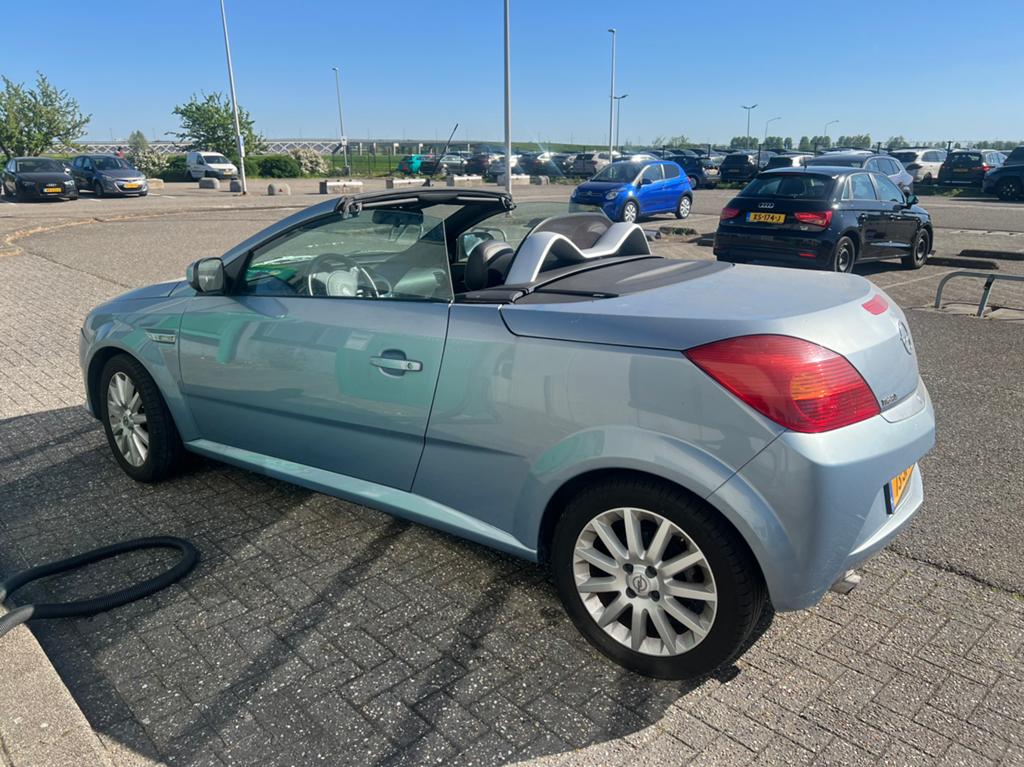 Opel Tigra 1.4 16V Twintop 2005 Blauw, Auto's, Opel, Voorwielaandrijving, Zwart, 4 cilinders, Cabriolet