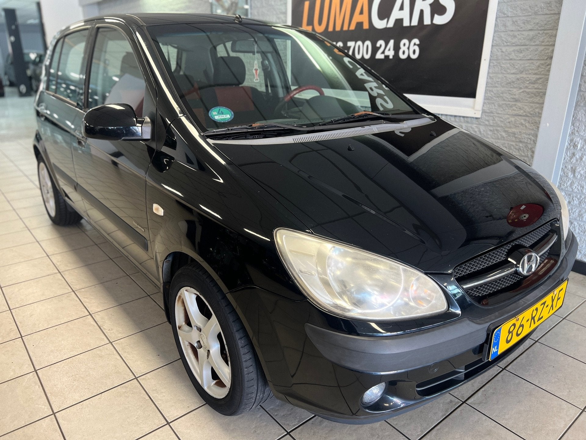 Hyundai Getz 1.4i First Edition | Airco | 5 deurs | Trekh. |, Voorwielaandrijving, 450 kg, 4 cilinders, Zwart