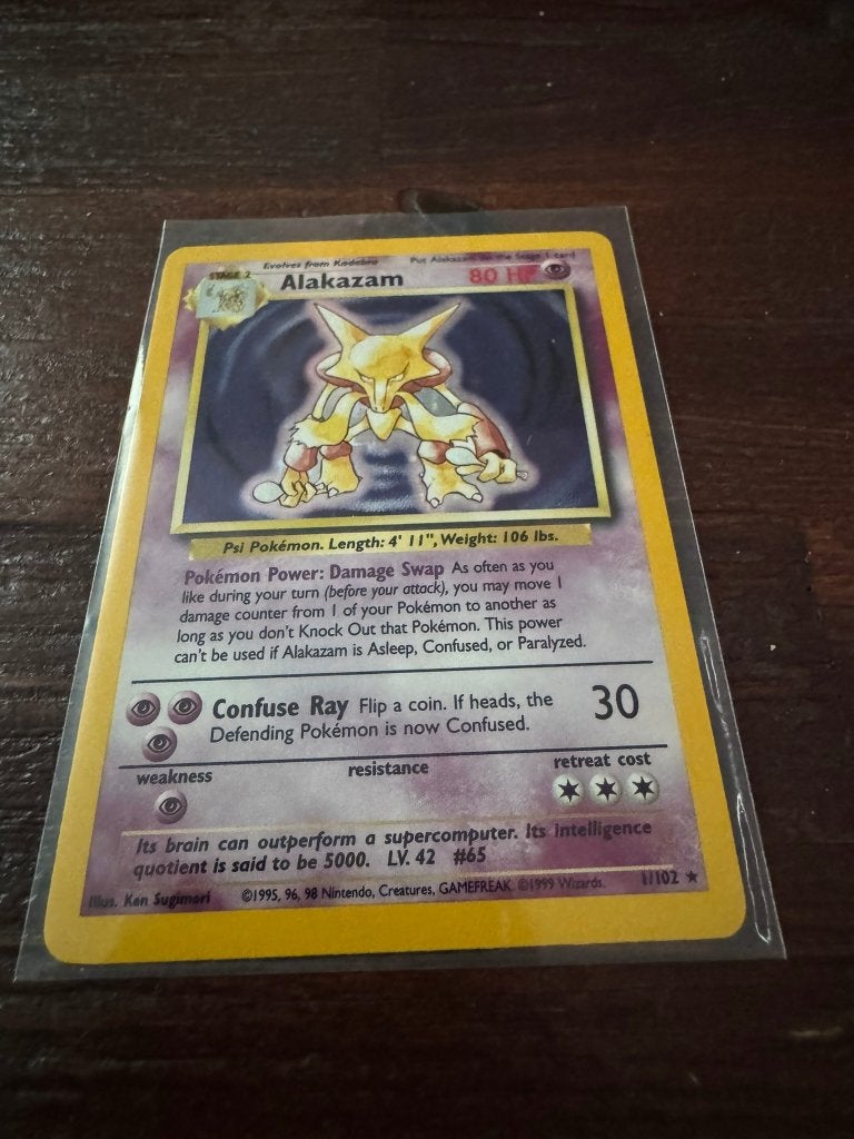 Pokémon Base Set 1/102 Alakazam holo (Engels), Ophalen of Verzenden, Zo goed als nieuw, Losse kaart