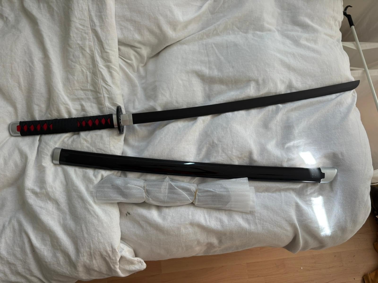 Katana van hout, Ophalen