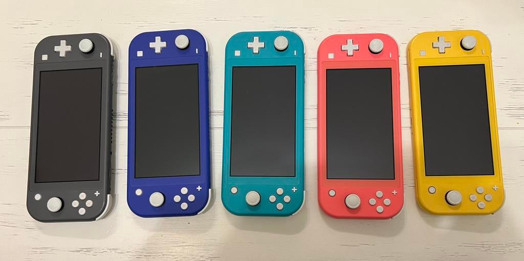 Nintendo Switch Lite - keuze uit 5 kleuren met 4 spellen, 1 speler, Ophalen of Verzenden, Zo goed als nieuw, Vanaf 3 jaar