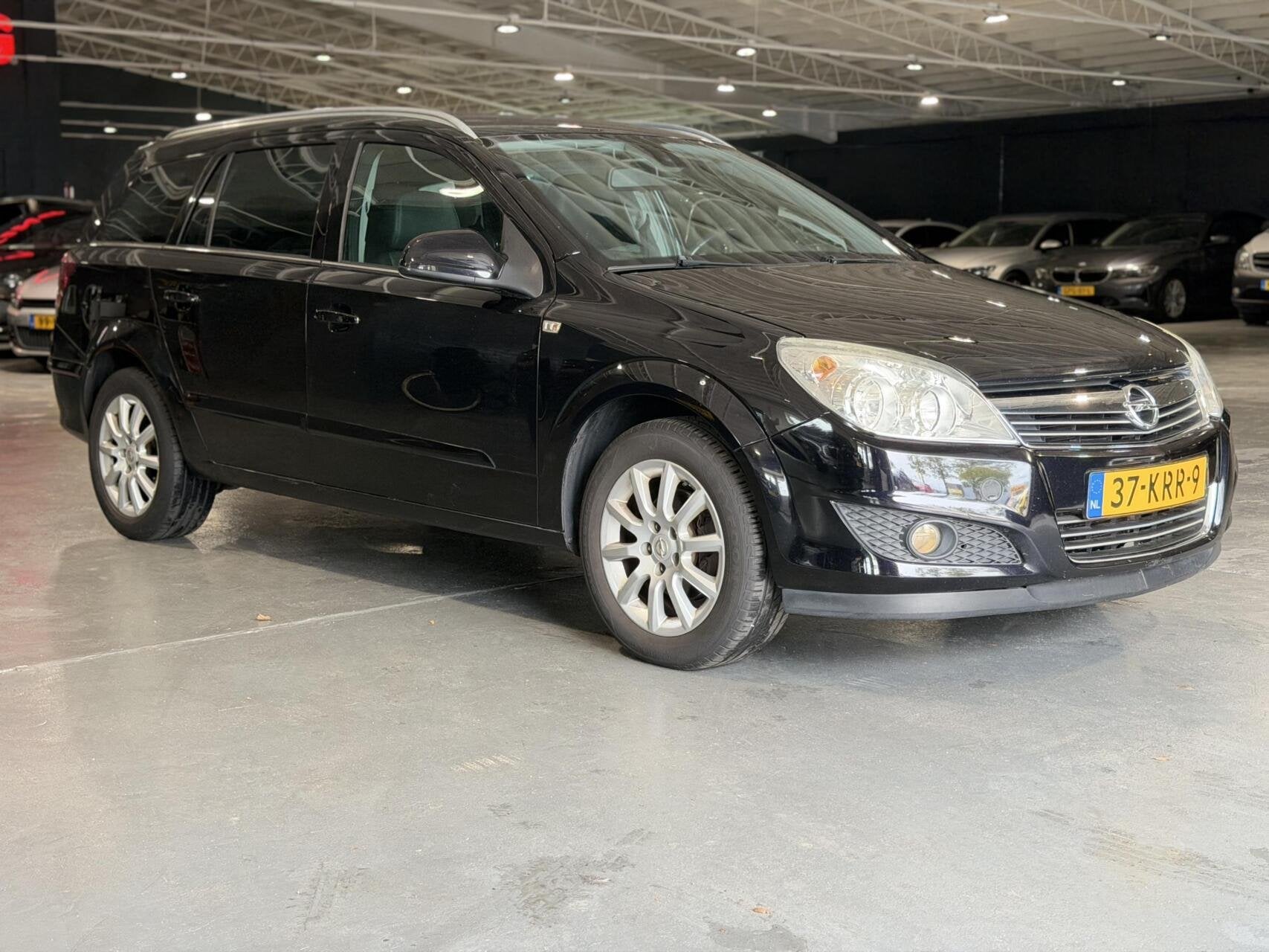 Opel Astra Wagon 1.6 Cosmo Cruise Leder, Voorwielaandrijving, 15 km/l, Gebruikt, 116 pk
