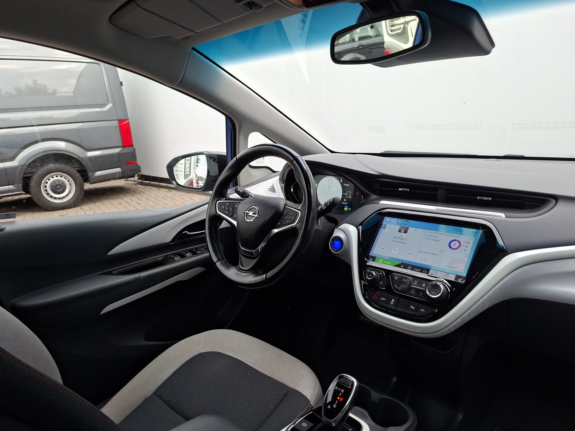Opel Ampera-E SOH 100% Executive 60 kWh Carplay Hoge zit Cli, Auto's, Opel, Gebruikt, Blauw, 204 pk, 423 km