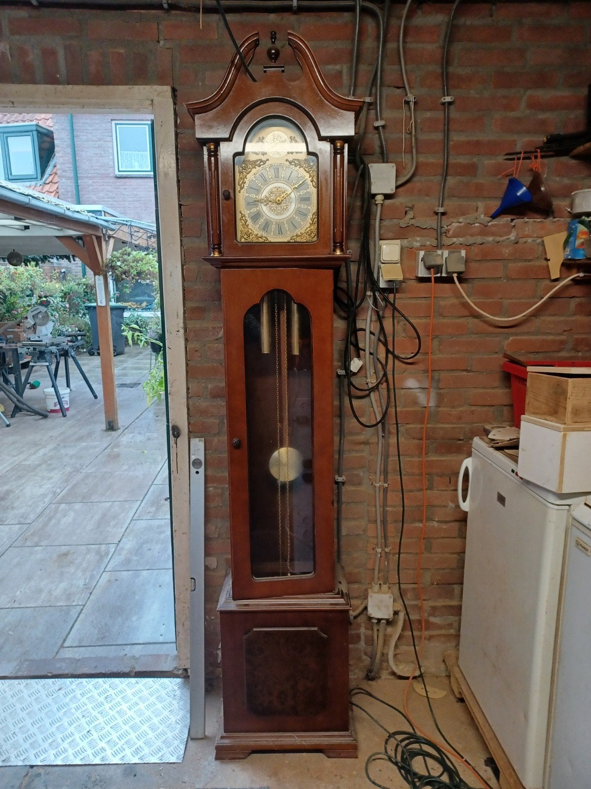 Grote staande klok Junghans Tempus fugit, Ophalen