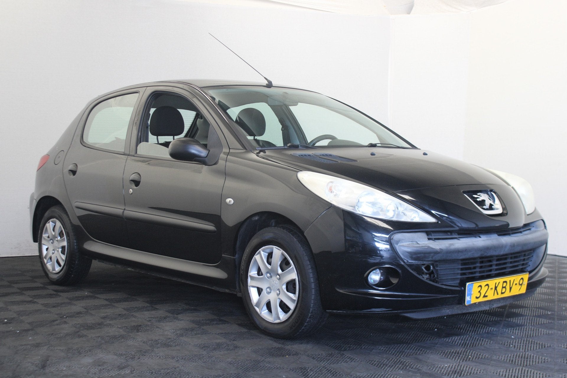 Peugeot 206+ 1.4 XS (bj 2009), Auto's, Voorwielaandrijving, 206+, Stof, 4 cilinders
