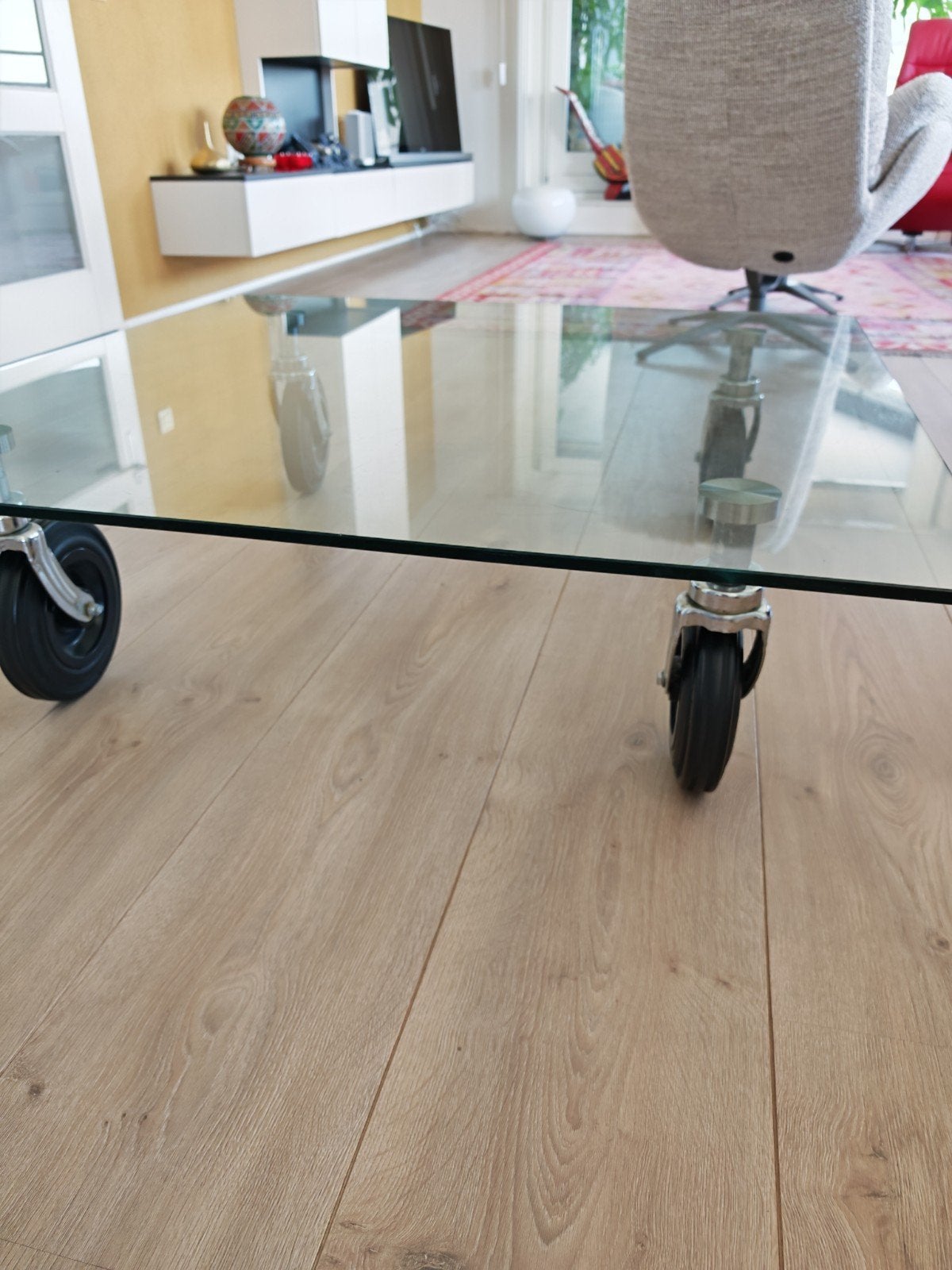 Glazen design salontafel 1x1 meter met wielen, Huis en Inrichting, Tafels | Salontafels, Ophalen of Verzenden, Rechthoekig, 100 tot 150 cm