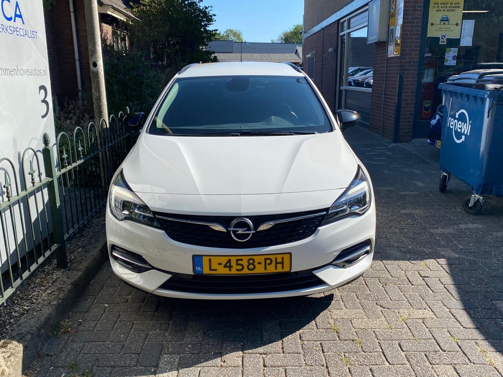 Opel Astra Sports Tourer 1.2 Business Edition (bj 2021), Auto's, Gebruikt, 1199 cc, Wit, Origineel Nederlands