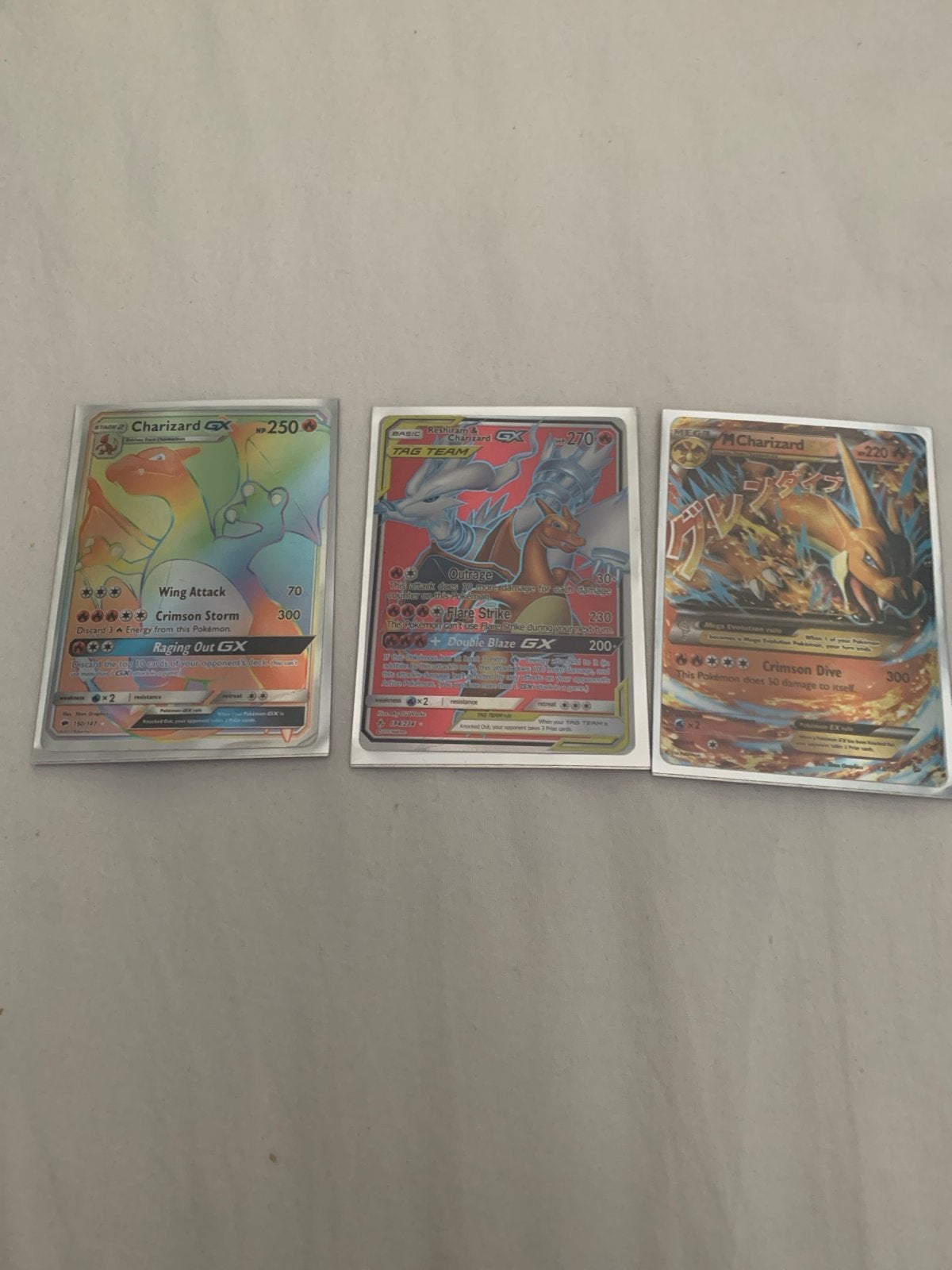 Pokémon Charizard GX en M Charizard EX kaarten, Hobby en Vrije tijd, Verzamelkaartspellen | Pokémon, Verzenden, Zo goed als nieuw