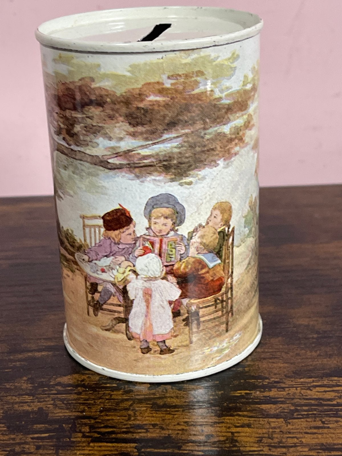 Vintage spaarpot met kinderillustraties, Ophalen of Verzenden, Gebruikt, Metaal of Blik, Overige thema's