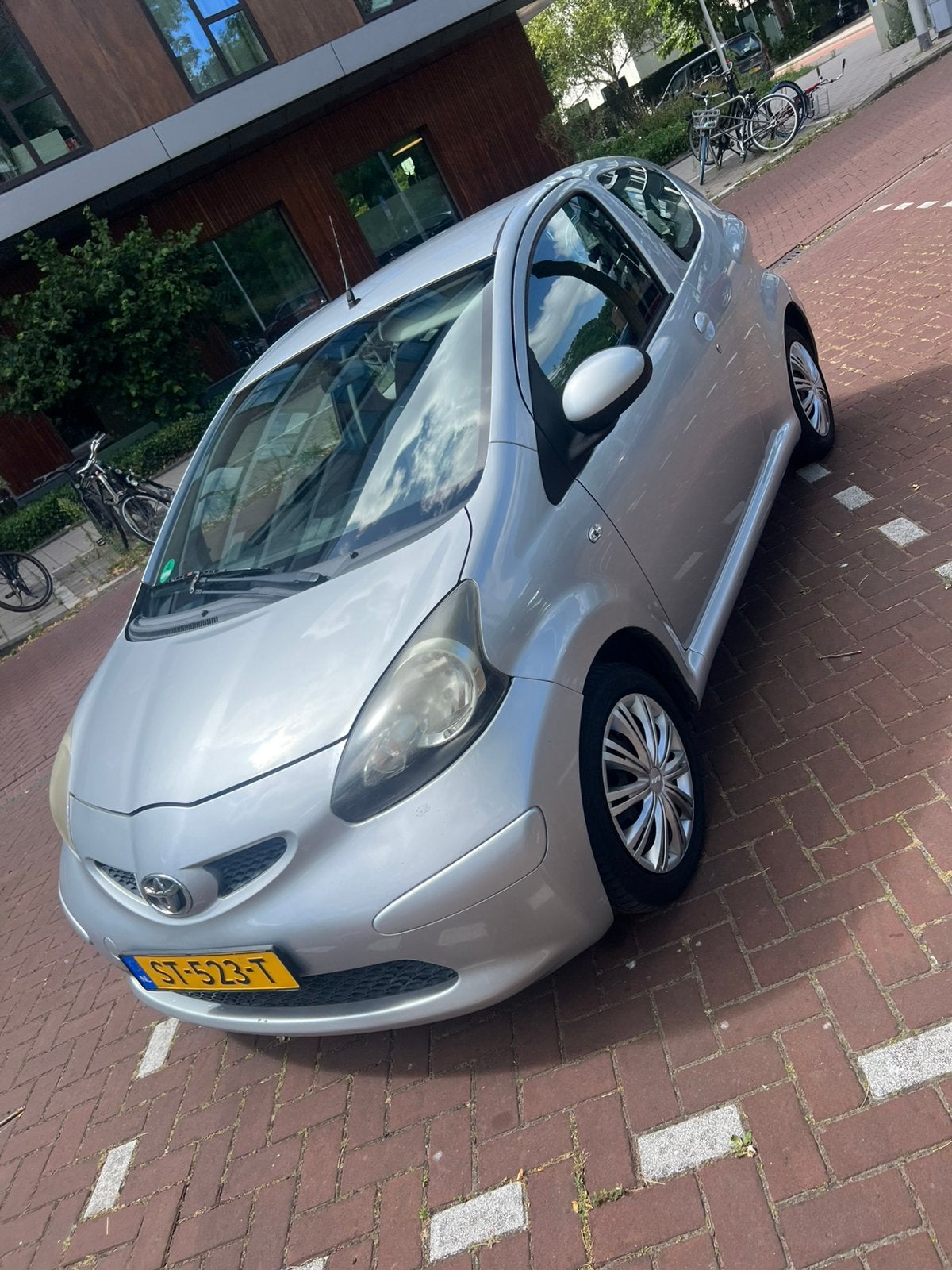 Toyota Aygo 1.0 12V Vvt-i 2006 Grijs, Auto's, Toyota, Voorwielaandrijving, 4 stoelen, 68 pk, Handgeschakeld