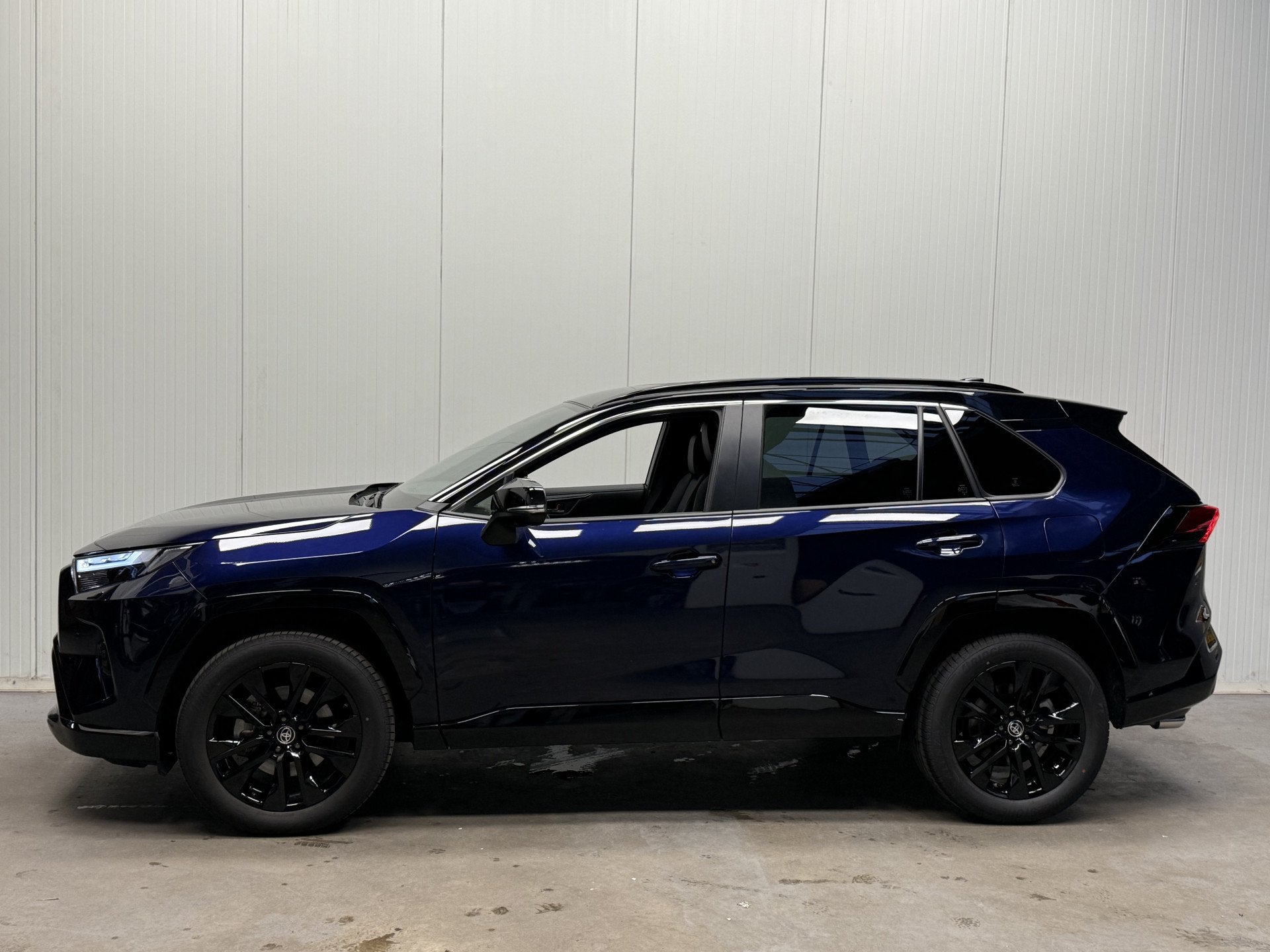 Toyota RAV4 2.5 Hybrid Style TWOTONE-LEDER-360CAMERA-JBL.S, Auto's, Gebruikt, 4 cilinders, Blauw, Leder en Stof