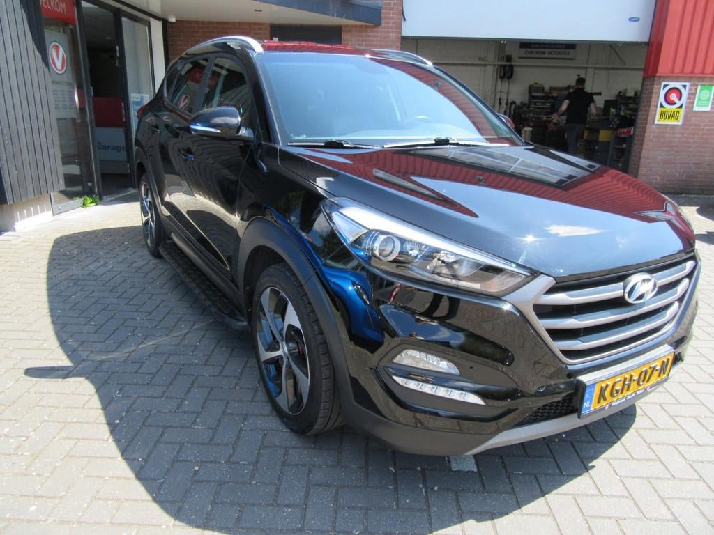 Hyundai TUCSON 1.6 T-GDi Comfort 4WD, Auto's, Hyundai, Gebruikt, 4 cilinders, Leder en Stof, Zwart