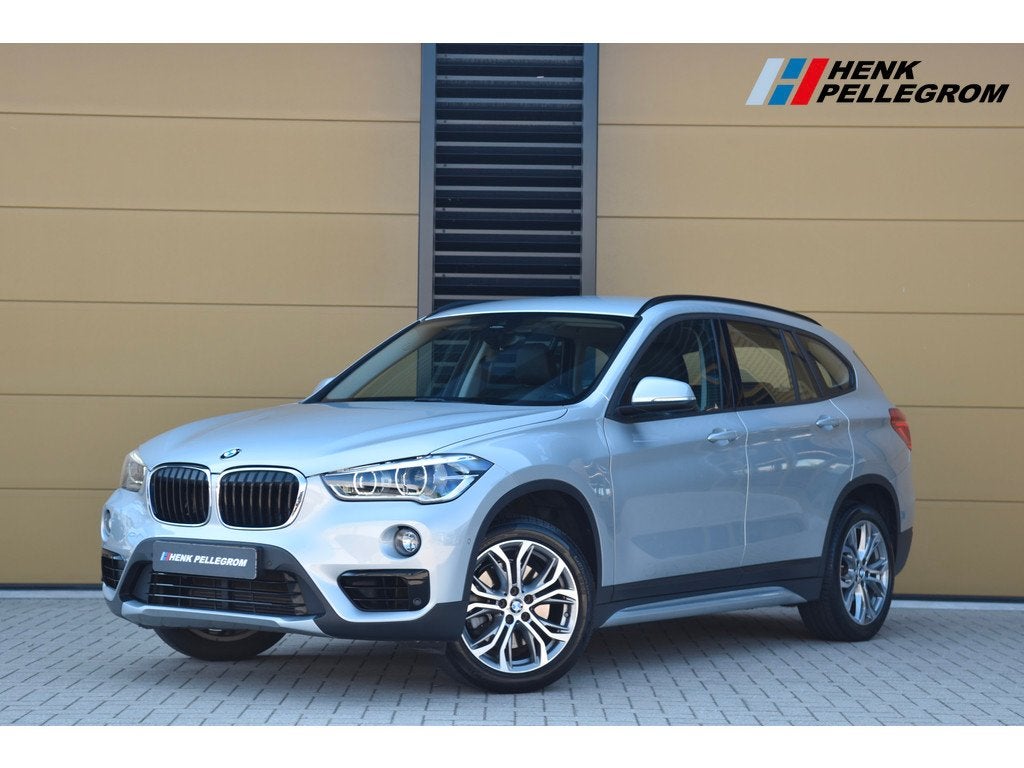 BMW X1 sDrive20i High Executive (bj 2018, automaat), Auto's, BMW, 1998 cc, Met garantie (alle), Bedrijf, Automatische klimaatregeling