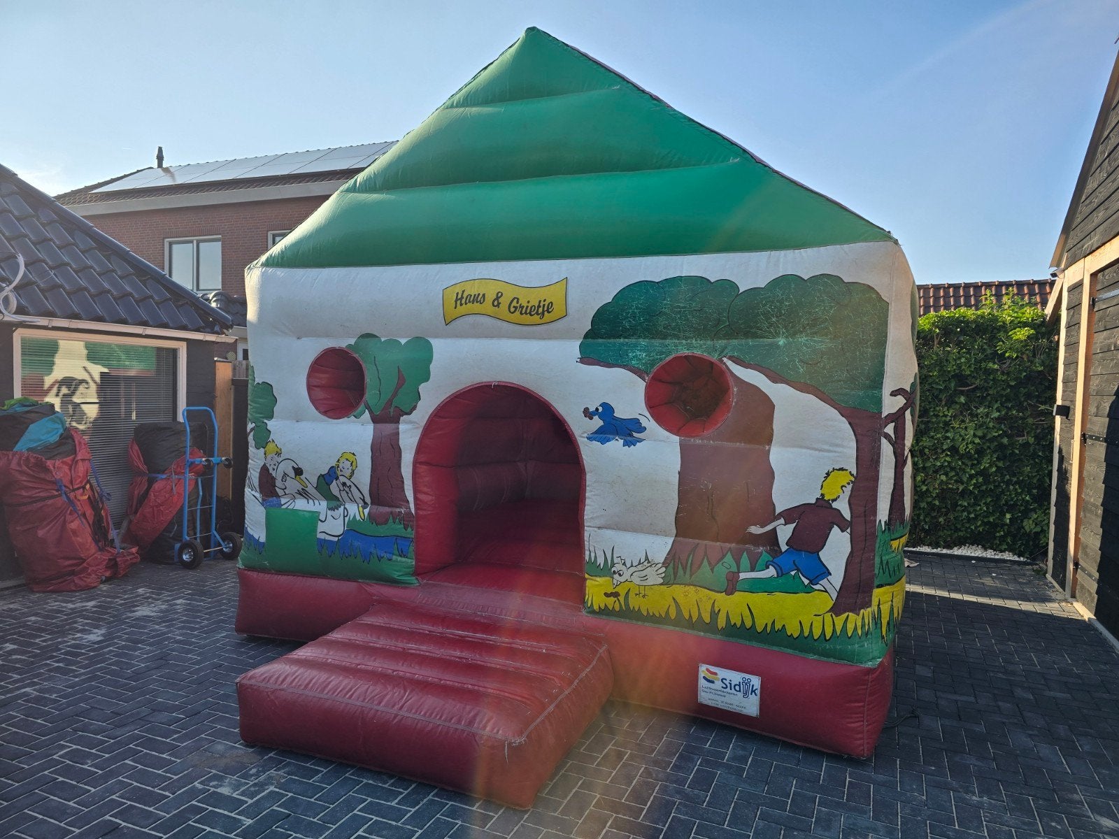 Springkussen Hans & Grietje 5x5m met dak en blower, Kinderen en Baby's, Speelgoed | Buiten | Springkussens, Ophalen, Gebruikt