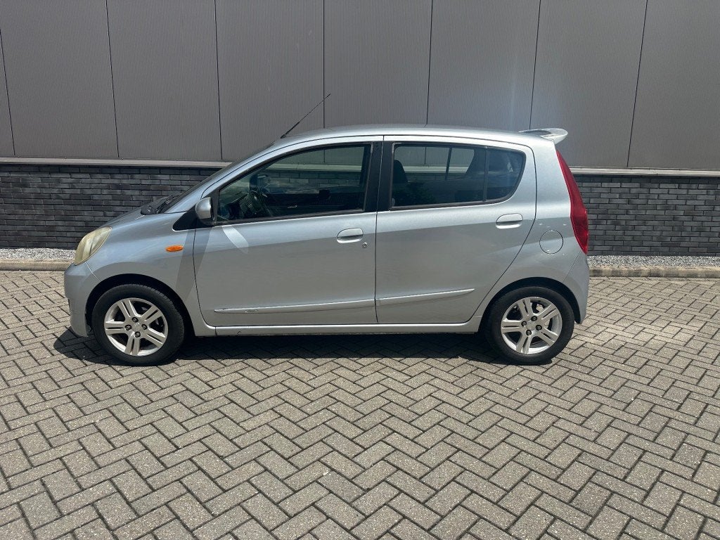 Daihatsu CUORE 1.0i + Airco  km stand Nap, Auto's, Daihatsu, Voorwielaandrijving, 18 €/maand, 4 stoelen, Cuore