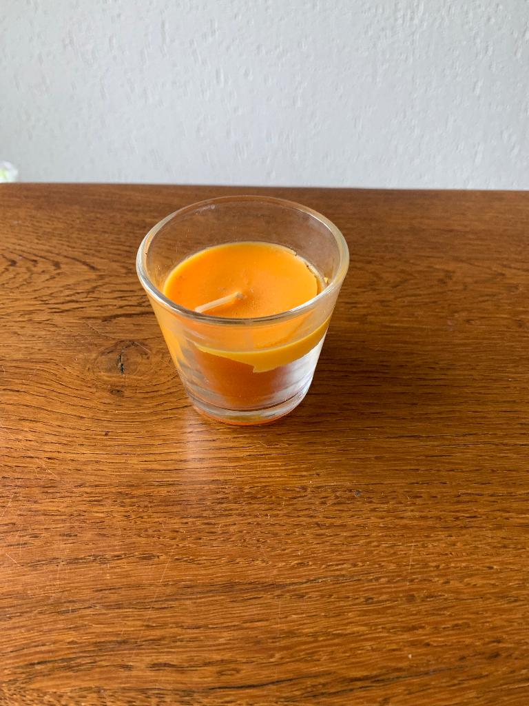 "Oranje Kaars in Glas" Nieuw, Huis en Inrichting, Woonaccessoires | Kandelaars en Kaarsen, Ophalen of Verzenden, Nieuw, Overige materialen