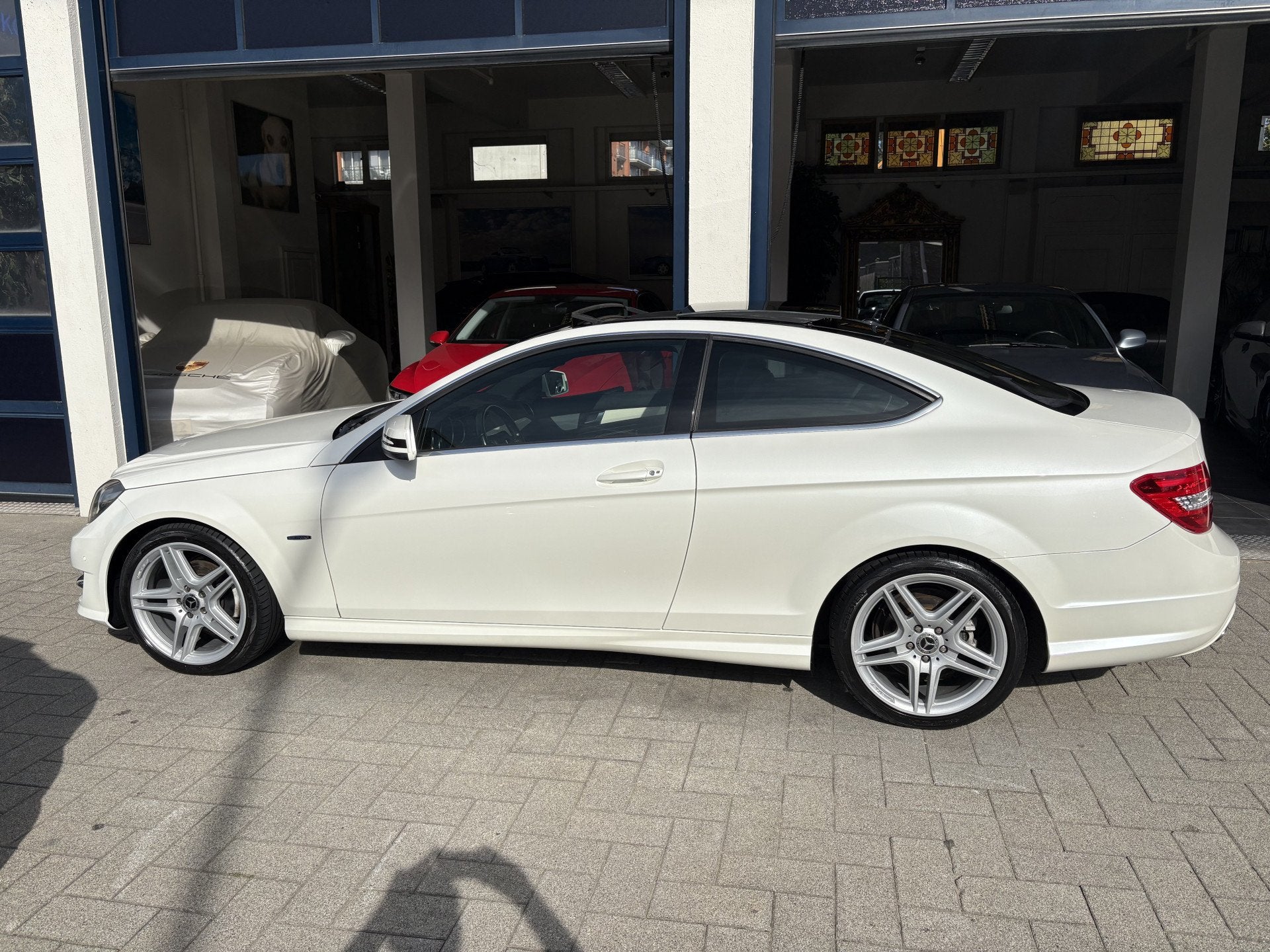 Mercedes-Benz C-Klasse Coupé 180 Ambition AMG/PANORAMA/LEDE, Euro 5, Achterwielaandrijving, Zwart, 4 stoelen
