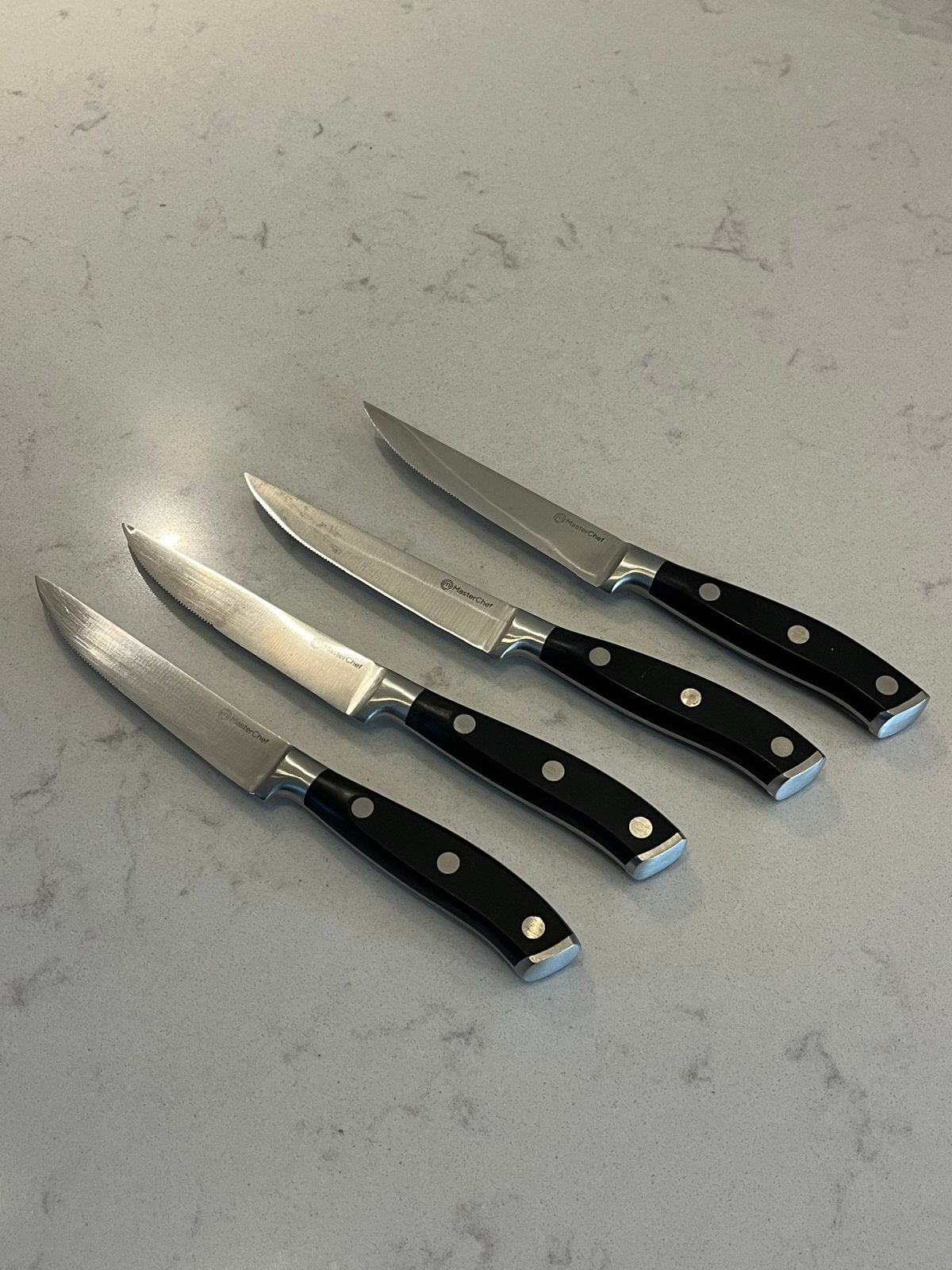 4x MasterChef Steakmessen - Gebruikt, Nette Staat, Gebruikt, Los bestek, Ophalen of Verzenden, Rvs of Chroom