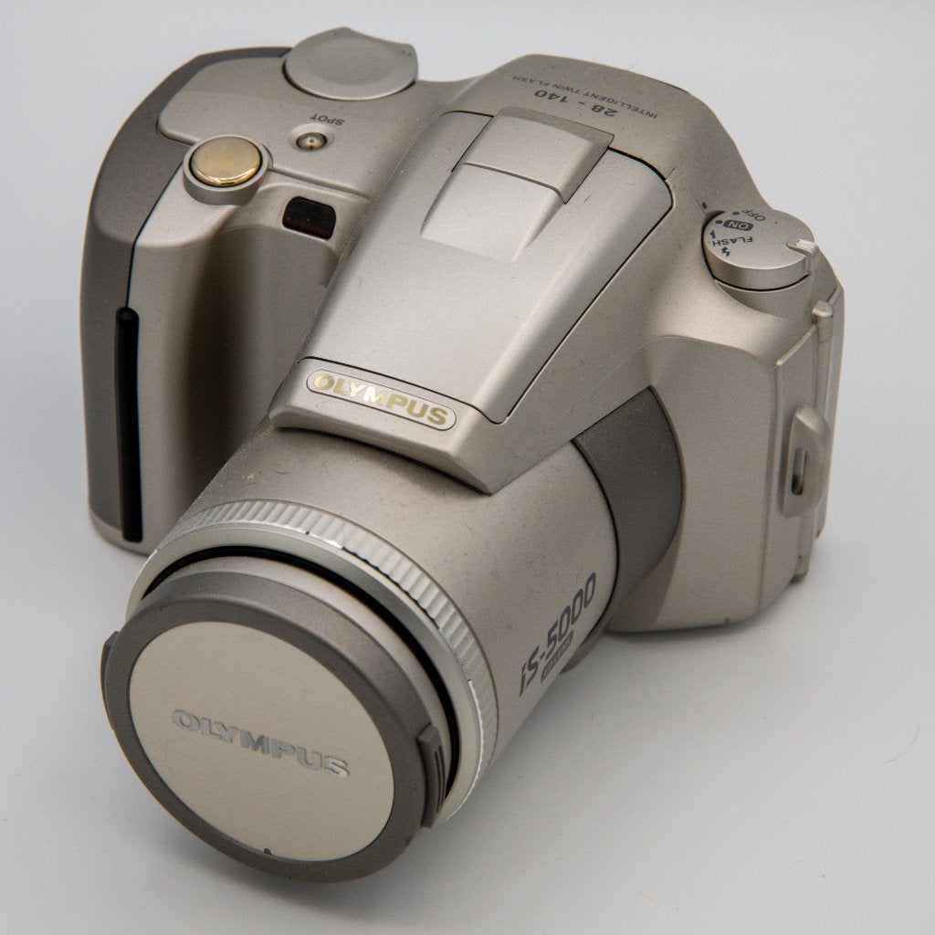 Defecte Olympus IS-5000 camera (met doos en handleiding), Ophalen of Verzenden, Niet werkend, Spiegelreflex, Olympus