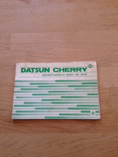 Datsun Cherry Instructieboekje Model N10 Serie 1979  NL, Auto diversen, Ophalen of Verzenden