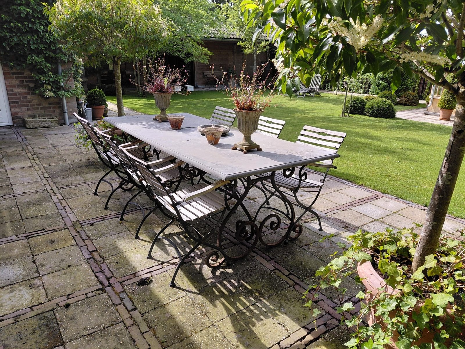 Hardstenen tuintafel met stalen onderstel 230x100 cm, Ophalen, Gebruikt, Rechthoekig, Metaal
