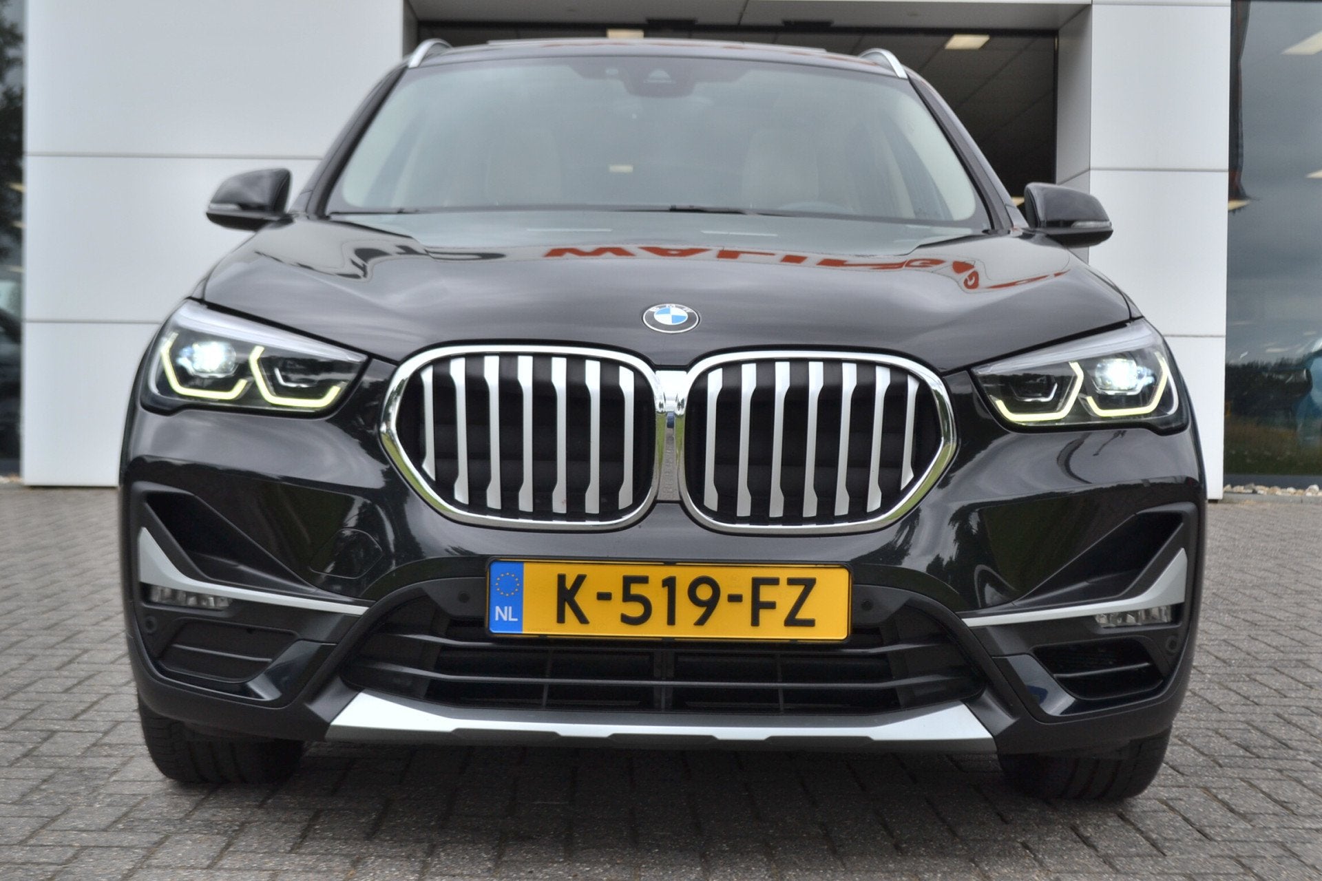 BMW X1 sDrive18i Panaramadak | Leer | Head up | Trekhaak 170, Auto's, Gebruikt, Euro 6, Zwart, Leder