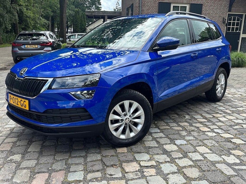 Skoda Karoq 1.0 TSI Bns Ed,nav,ecc,lmv (bj 2022), Auto's, Voorwielaandrijving, Gebruikt, Euro 6, Blauw
