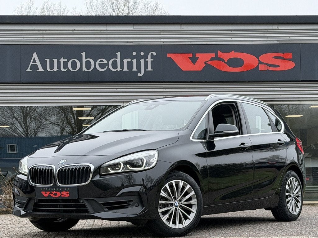 BMW 2 Serie Active Tourer 218i | Automaat | Cruise | Trekhaa, Auto's, BMW, Stof, Gebruikt, Met garantie (alle), Zwart