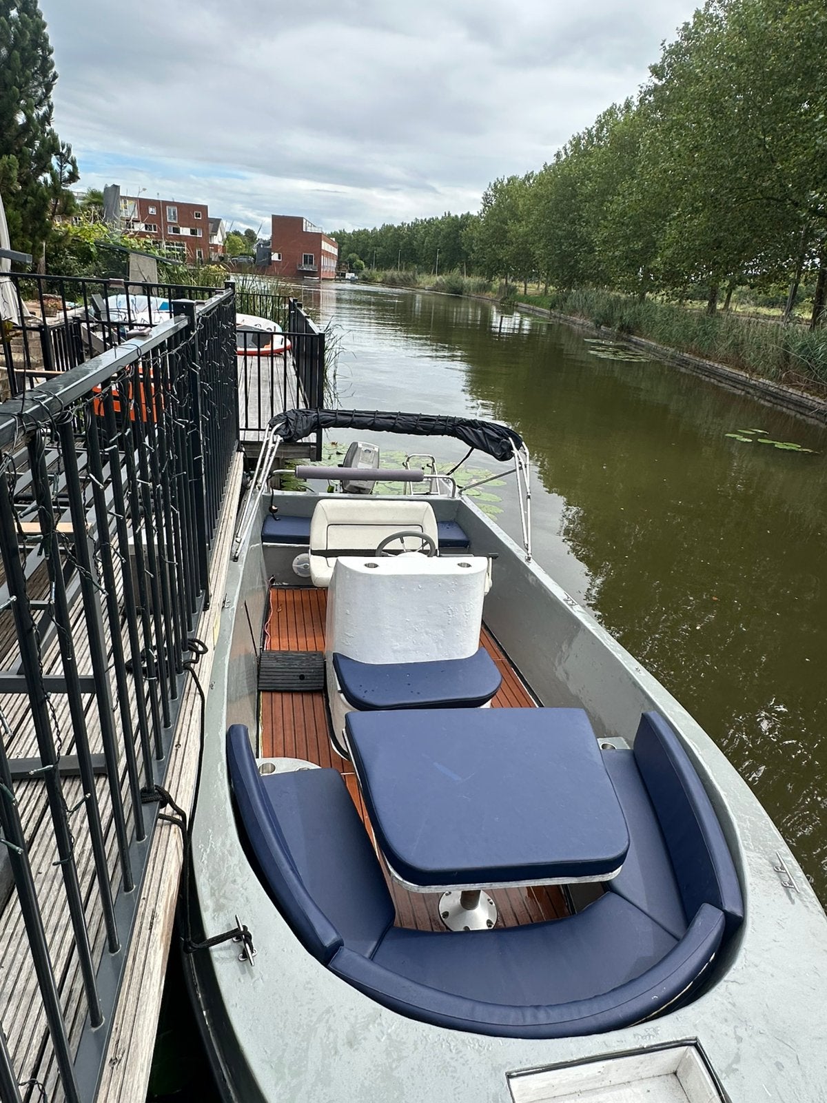 Leuke console boot inclusief trailer 10pk, Ophalen, Zo goed als nieuw, Buitenboordmotor, Trailer